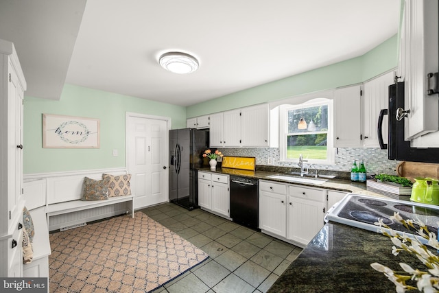 1576 Delong Dr, Downingtown, PA 19335 - kitchen with black appliances, a sink, backsplash, and white cabinets