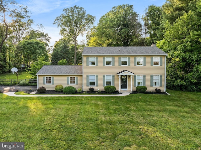 1576 Delong Dr, Downingtown, PA 19335 - view of front facade featuring a chimney and view of scattered trees