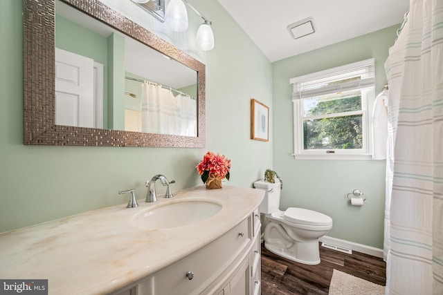 1576 Delong Dr, Downingtown, PA 19335 - bathroom featuring toilet, wood finished floors, vanity, and baseboards