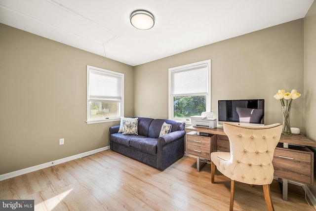 1576 Delong Dr, Downingtown, PA 19335 - home office featuring attic access, light wood-style floors, plenty of natural light, and baseboards