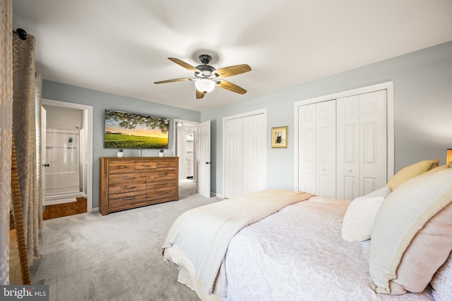 1576 Delong Dr, Downingtown, PA 19335 - carpeted bedroom with multiple closets, a ceiling fan, connected bathroom, and baseboards