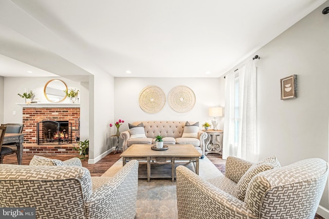 1576 Delong Dr, Downingtown, PA 19335 - living room featuring a brick fireplace, recessed lighting, wood finished floors, and baseboards