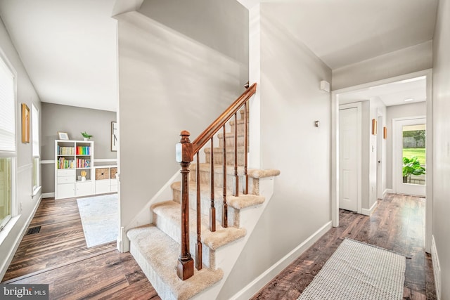 1576 Delong Dr, Downingtown, PA 19335 - stairs featuring wood finished floors and baseboards