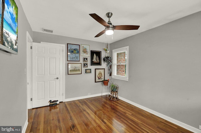 102 Radcliffe Ave, Reading, PA 19609 - unfurnished room with baseboards, wood finished floors, and a ceiling fan