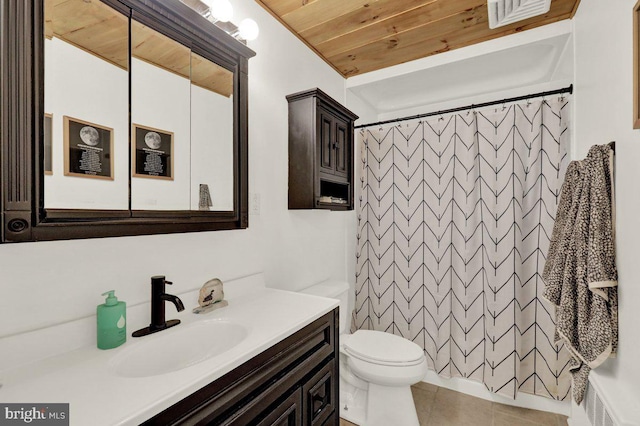 102 Radcliffe Ave, Reading, PA 19609 - full bathroom with vanity, toilet, curtained shower, and tile patterned floors