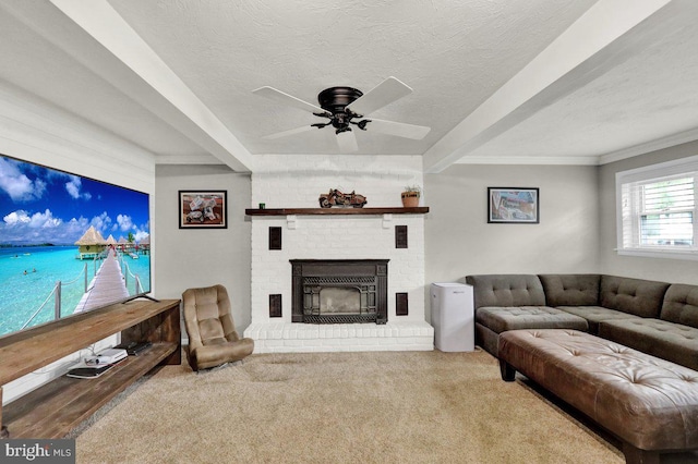 102 Radcliffe Ave, Reading, PA 19609 - living area featuring a ceiling fan, a fireplace, carpet flooring, crown molding, and a textured ceiling