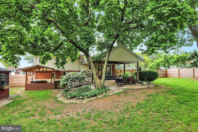 102 Radcliffe Ave, Reading, PA 19609 - back of house with a patio area, a gazebo, and brick siding
