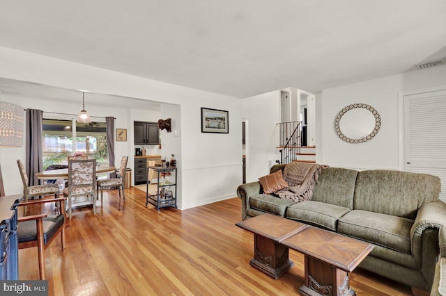 102 Radcliffe Ave, Reading, PA 19609 - living area with light wood-style flooring and stairs