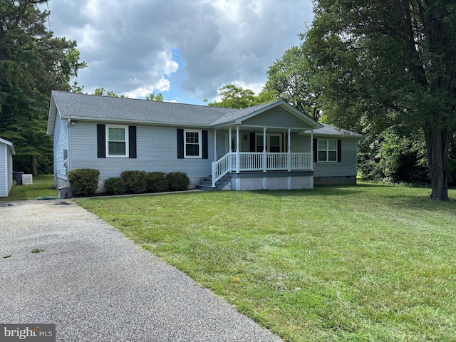 29799 Allen Rd, Mechanicsville, MD 20659 - single story home featuring covered porch, crawl space, a front lawn, and roof with shingles