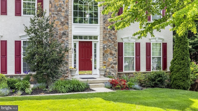 430 Dartmouth Ln, West Grove, PA 19390 - entrance to property featuring stone siding, stucco siding, and a lawn