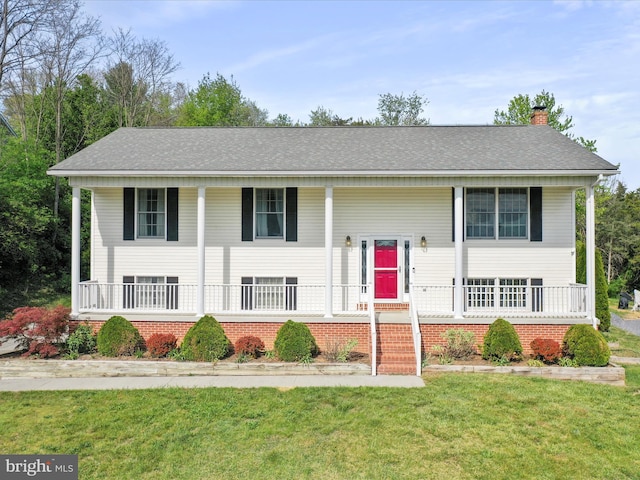 1204 S Fork Dr, Front Royal, VA 22630 - raised ranch with a chimney, a porch, a front yard, and a shingled roof