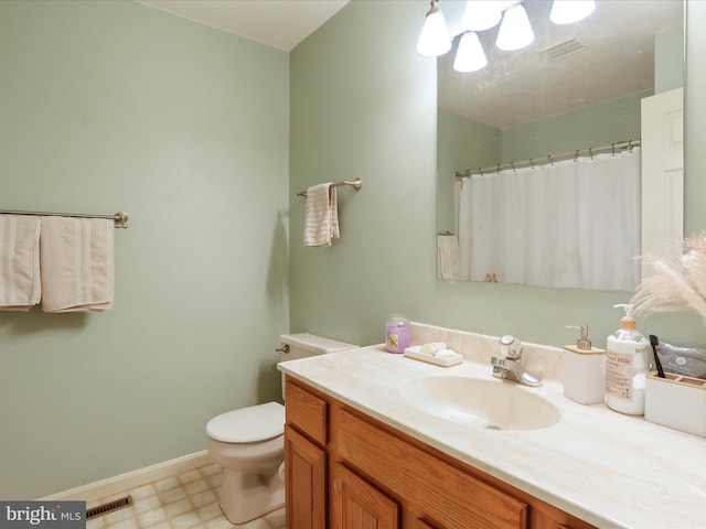 1204 S Fork Dr, Front Royal, VA 22630 - bathroom with toilet, vanity, tile patterned floors, baseboards, and a shower with curtain