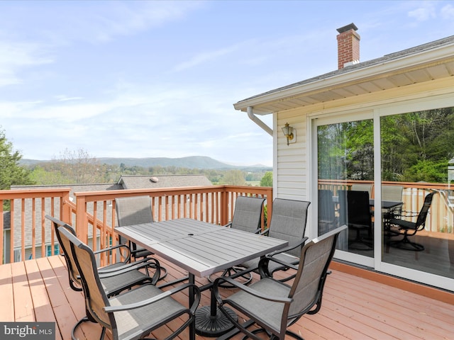 1204 S Fork Dr, Front Royal, VA 22630 - wooden terrace with outdoor dining area and a mountain view