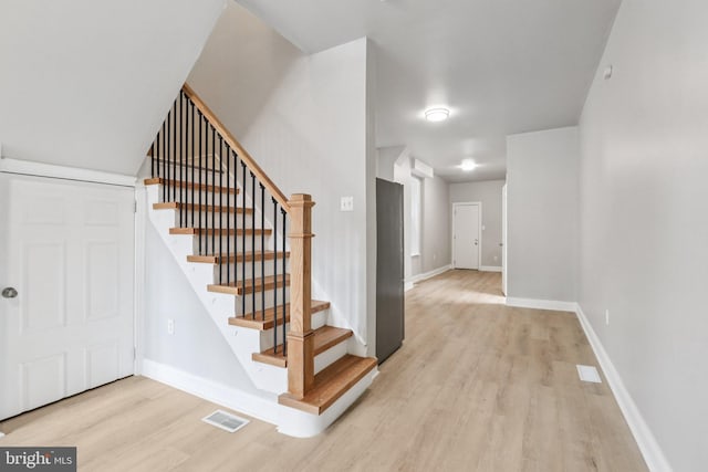 308 S 56th St, Philadelphia, PA 19143 - stairs featuring wood finished floors and baseboards