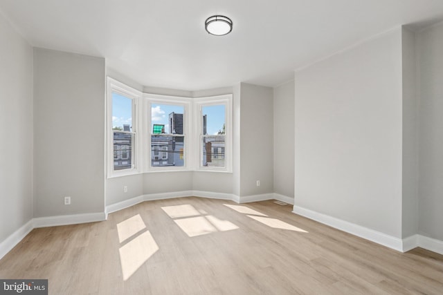 308 S 56th St, Philadelphia, PA 19143 - unfurnished room featuring light wood-style flooring and baseboards