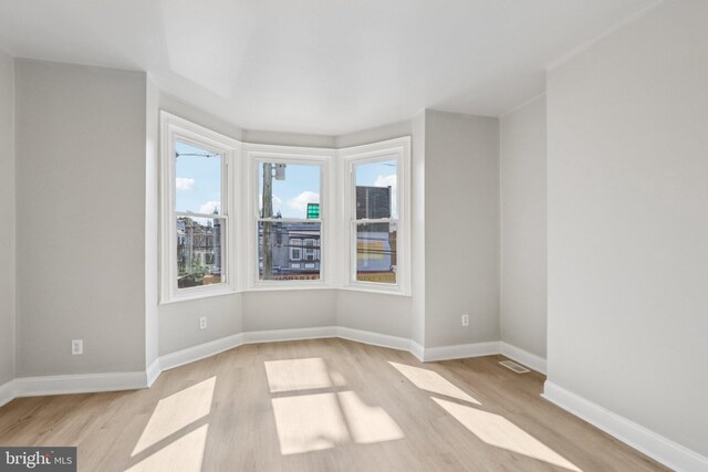 308 S 56th St, Philadelphia, PA 19143 - empty room with light wood-type flooring and baseboards