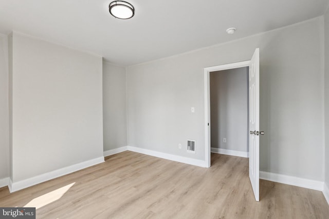 308 S 56th St, Philadelphia, PA 19143 - unfurnished room with wood finished floors, baseboards, and a smoke detector