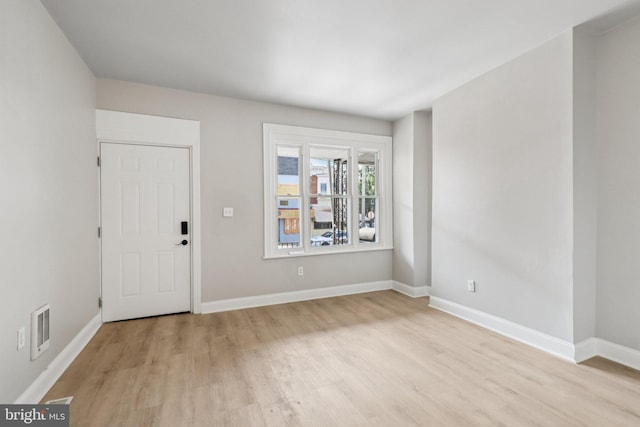 308 S 56th St, Philadelphia, PA 19143 - foyer entrance with light wood-style flooring and baseboards