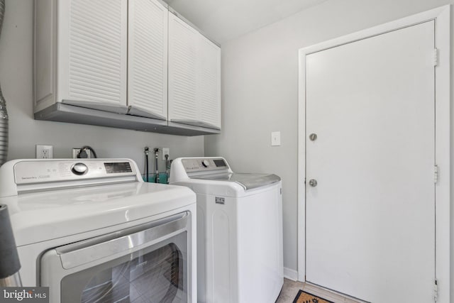 9207 Bois Ave, Vienna, VA 22182 - washroom with cabinet space and washing machine and clothes dryer