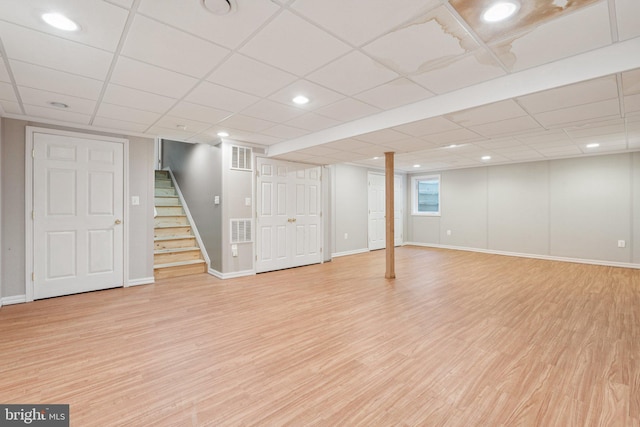 9207 Bois Ave, Vienna, VA 22182 - finished basement featuring stairway, light wood-style flooring, recessed lighting, and a drop ceiling
