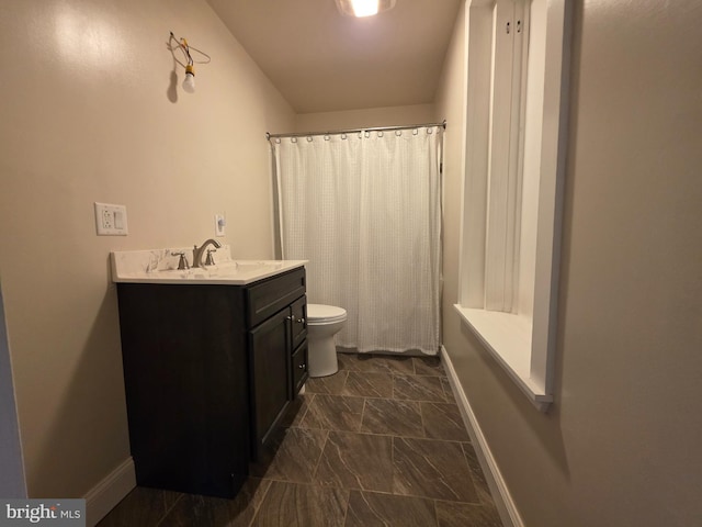 120 S Morwood Ave, Reading, PA 19609 - bathroom featuring vanity, toilet, baseboards, and marble finish floors