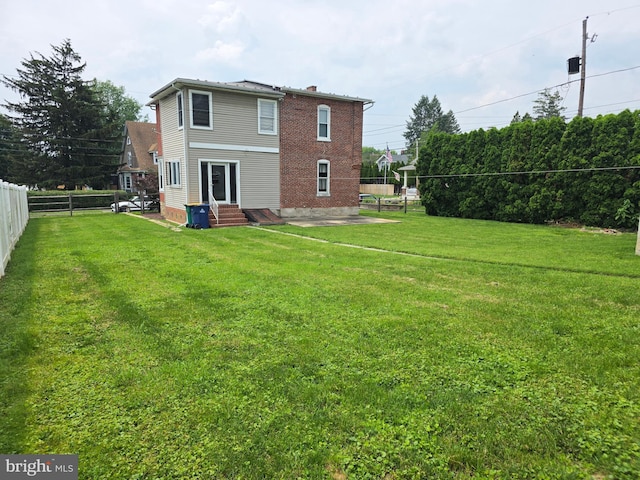 120 S Morwood Ave, Reading, PA 19609 - back of house with entry steps, a chimney, and a patio