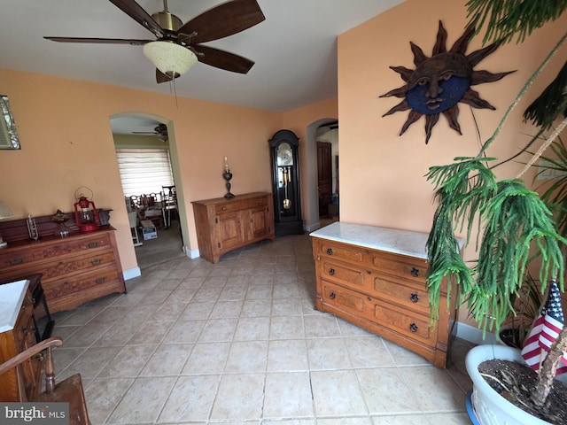 120 S Morwood Ave, Reading, PA 19609 - foyer featuring arched walkways, ceiling fan, light tile patterned floors, and baseboards