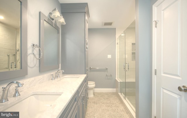 1 Wembley Dr, Mount Laurel, NJ 08054 - full bath with a shower stall, double vanity, toilet, and baseboards