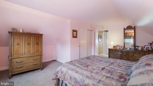 126 Heartwood Rd, Levittown, PA 19056 - bedroom with light colored carpet, vaulted ceiling, and baseboards