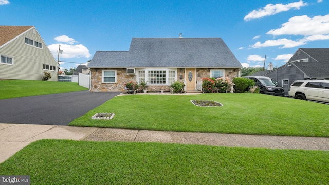 126 Heartwood Rd, Levittown, PA 19056 - cape cod house with stone siding and a shingled roof