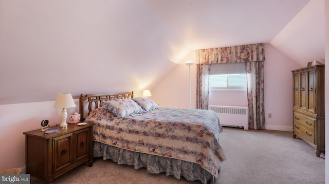 126 Heartwood Rd, Levittown, PA 19056 - bedroom featuring radiator heating unit, vaulted ceiling, and light colored carpet