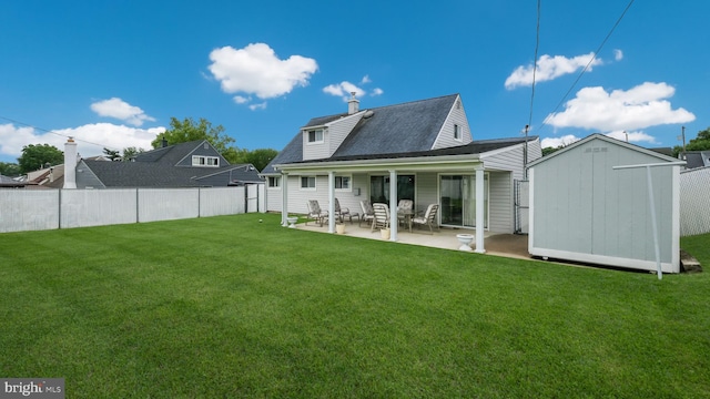 126 Heartwood Rd, Levittown, PA 19056 - rear view of house with a patio area