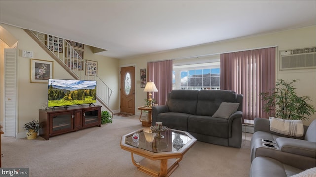 126 Heartwood Rd, Levittown, PA 19056 - carpeted living area featuring an AC wall unit, stairway, a baseboard radiator, and baseboards