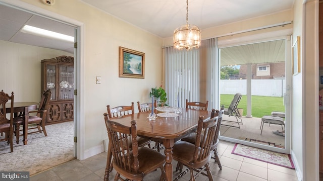 126 Heartwood Rd, Levittown, PA 19056 - dining room featuring a chandelier and light tile patterned flooring