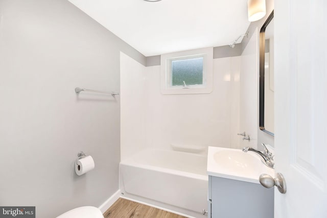 223 One Mile Run Rd, Philipsburg, PA 16866 - bathroom with vanity, wood finished floors, baseboards, toilet, and shower / bath combination