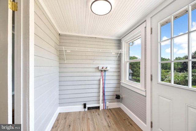 223 One Mile Run Rd, Philipsburg, PA 16866 - washroom featuring wood finished floors, baseboards, plenty of natural light, wood walls, and wooden ceiling