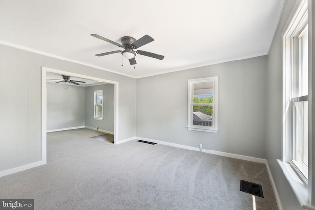 223 One Mile Run Rd, Philipsburg, PA 16866 - carpeted spare room with baseboards, ceiling fan, and ornamental molding
