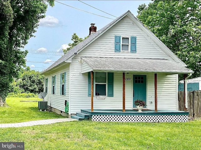 4300 Strauss Ave, Indian Head, MD 20640 - bungalow-style home with a porch, roof with shingles, and a chimney
