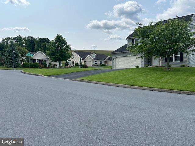 69 Geisinger Ln, Lewistown, PA 17044 - view of front of property featuring driveway, a front lawn, and a residential view