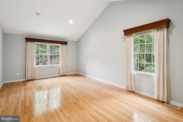 2 Teaberry Ct, Shamong, NJ 08088 - unfurnished room with light wood-style floors, lofted ceiling, and healthy amount of natural light