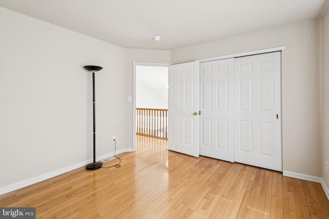 2 Teaberry Ct, Shamong, NJ 08088 - unfurnished bedroom with light wood finished floors and a closet