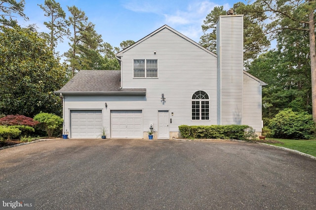 2 Teaberry Ct, Shamong, NJ 08088 - view of home's exterior with asphalt driveway, a chimney, a garage, and a shingled roof