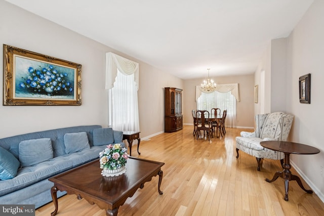 2 Teaberry Ct, Shamong, NJ 08088 - living area featuring a chandelier and light wood-style flooring