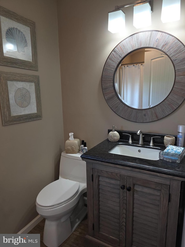 367 Dock Rd, West Creek, NJ 08092 - bathroom featuring vanity, toilet, and wood finished floors