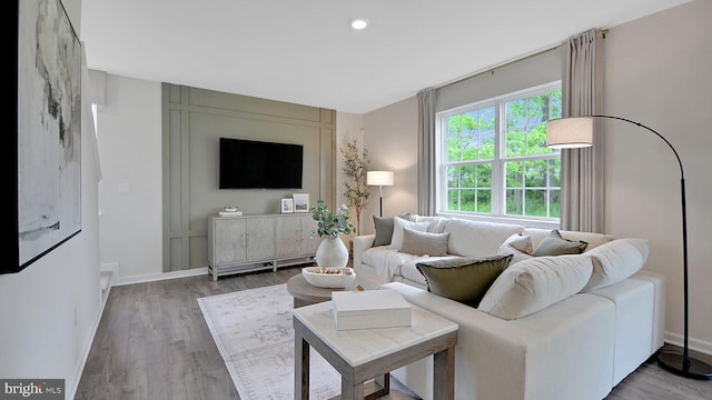 2041 Gregory Dr, Allentown, PA 18103 - living room featuring wood finished floors, baseboards, and recessed lighting