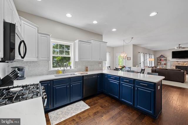 6 Falcon Cir, Lebanon, PA 17042 - kitchen with stainless steel appliances, a sink, blue cabinetry, white cabinets, and recessed lighting