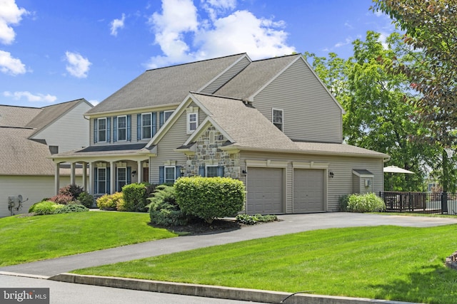 6 Falcon Cir, Lebanon, PA 17042 - traditional-style home featuring asphalt driveway, stone siding, and a shingled roof