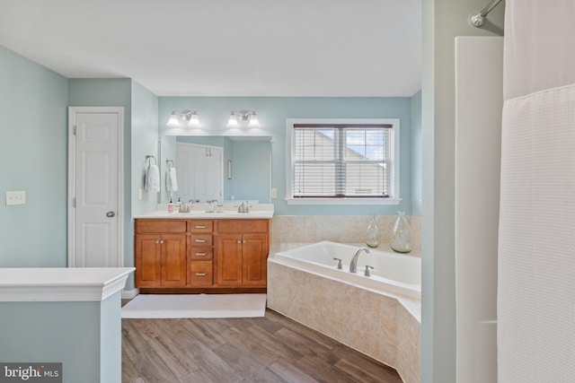 6 Falcon Cir, Lebanon, PA 17042 - bathroom with wood finished floors, a bath, and double vanity