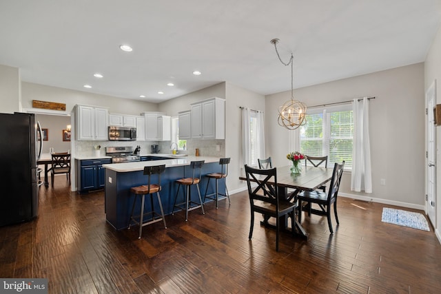 6 Falcon Cir, Lebanon, PA 17042 - dining space with a chandelier, dark wood finished floors, recessed lighting, and baseboards