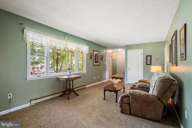 108 Oakmont Cir, Winchester, VA 22602 - living area with a baseboard heating unit, carpet, and a textured ceiling